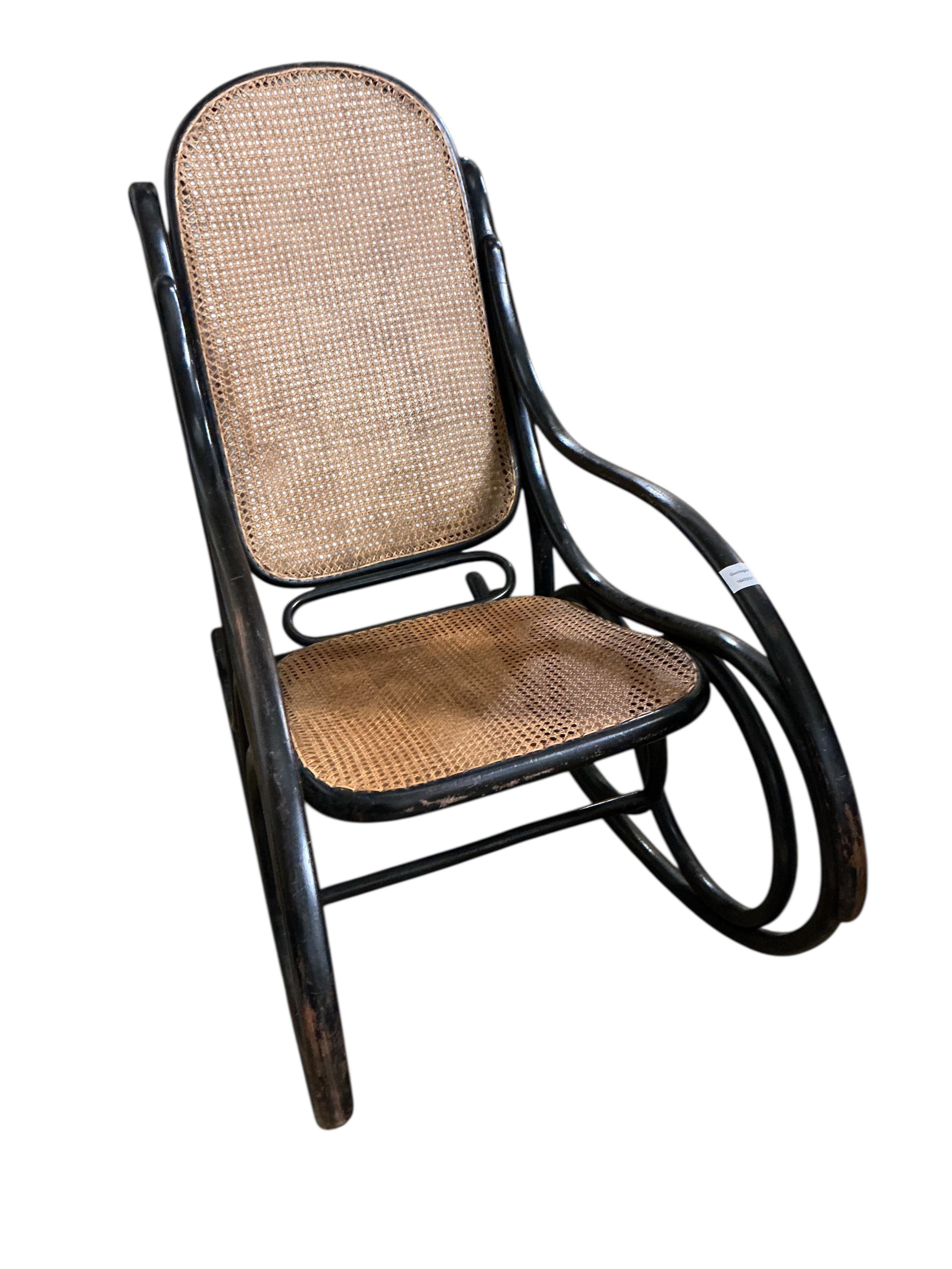 A Thonet ebonised bentwood rocking chair, width 54cm, depth 100cm, height 98cm